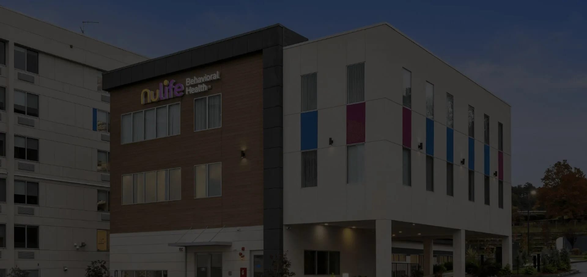 Nulife Behavioral Health building exterior at dusk in Framingham Massachusetts